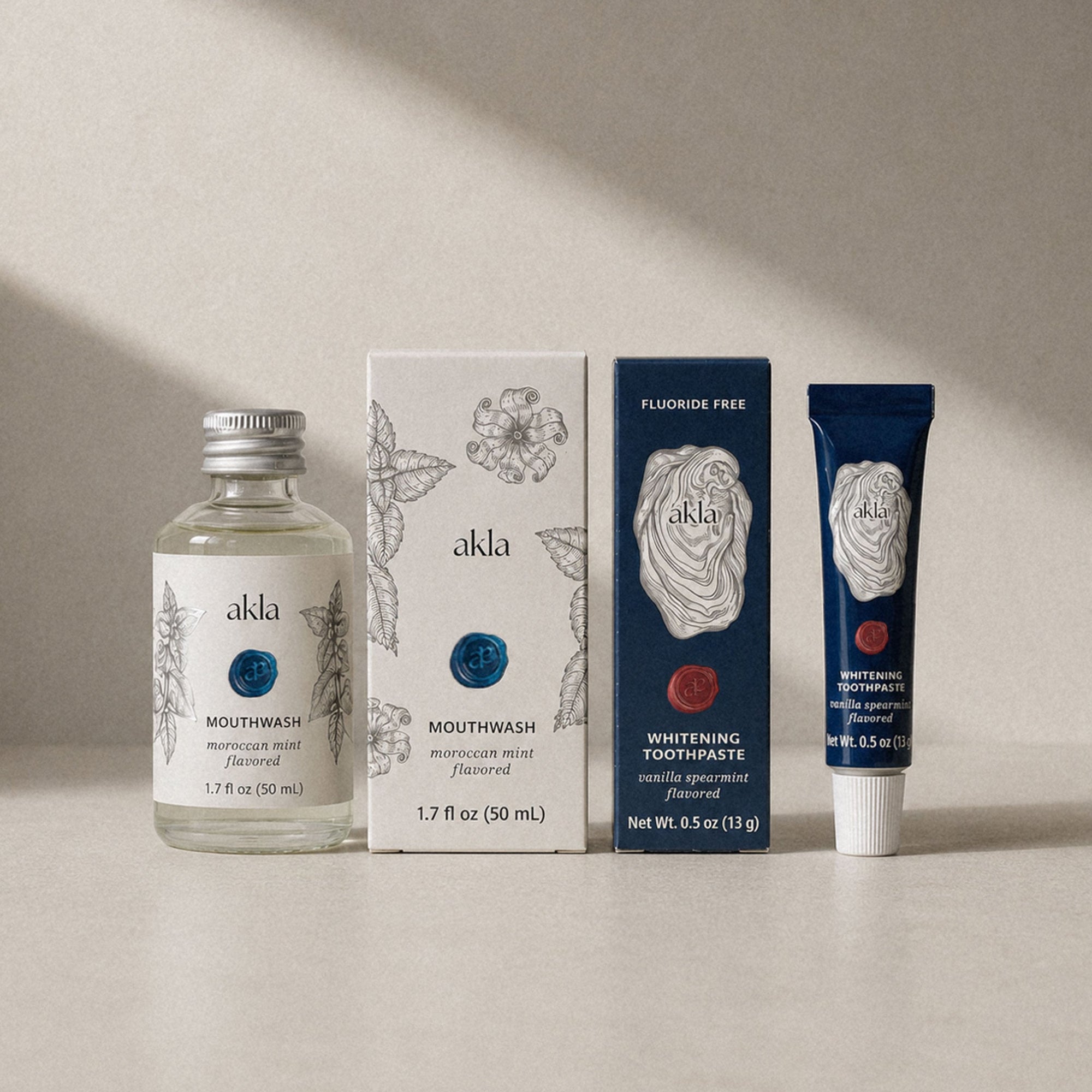 Akla travel size toothpaste and mouthwash set