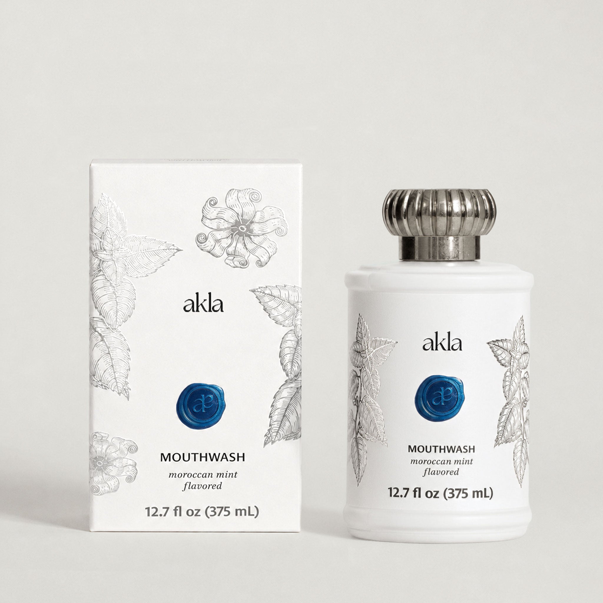 Akla Moroccan Mint Mouthwash with matching carton packaging. Alcohol-free botanical mouthwash formulated in Switzerland.