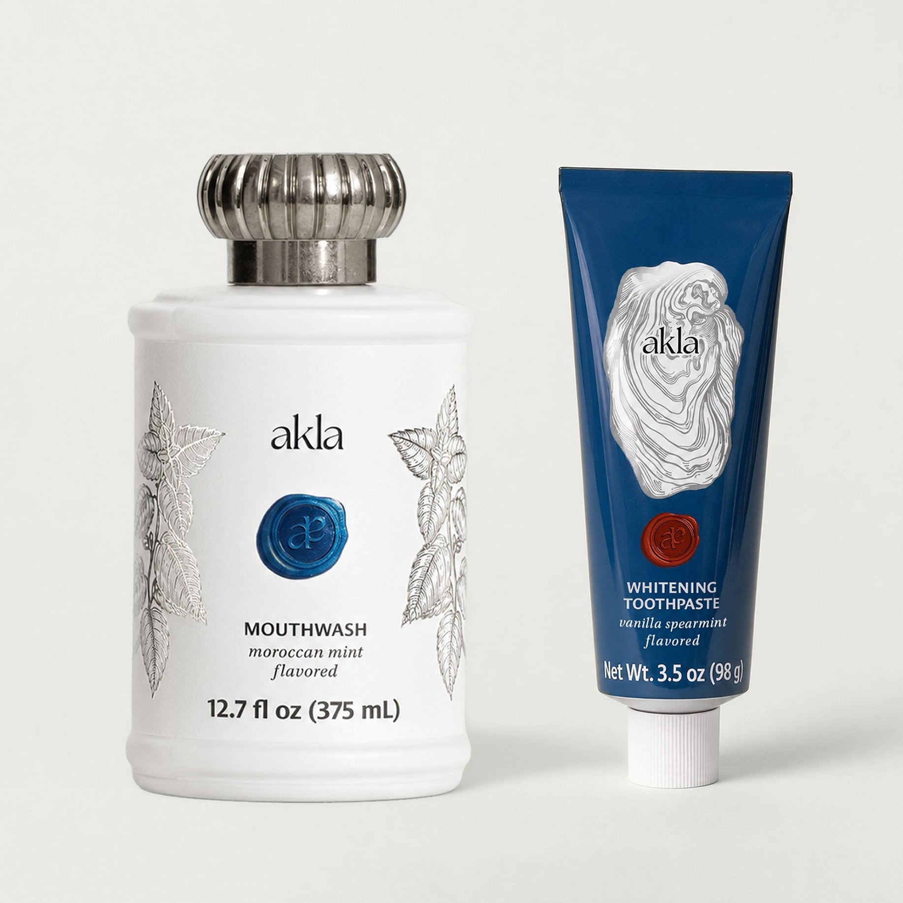 Akla Essentials Set with hydroxyapatite toothpaste and alcohol-free mouthwash. Swiss-made fluoride-free oral care.